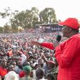 President Uhuru Kenyatta addresses his supporters during a tour in Kiambu County.