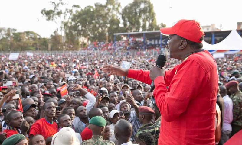 President Uhuru Kenyatta addresses his supporters during a tour in Kiambu County.