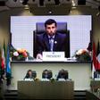 UAE Energy Minister Suhail al-Mazrouei, seen here addressing the December 7 meeting at which OPEC and some non-OPEC producers agreed to cut oil output, says they will meet again in April to review the impact