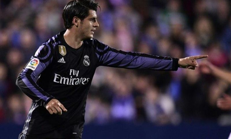 Real Madrid's forward Alvaro Morata celebrates after scoring their third goal during the Spanish league football match Club Deportivo Leganes SAD vs Real Madrid CF April 5, 2017