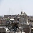 A picture taken on June 25, 2017 shows Mosul's destroyed ancient leaning minaret, known as the "Hadba" (Hunchback), in the Old City after being blown up by Islamic State group fighters