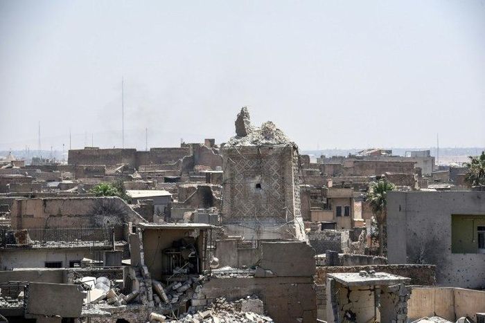 A picture taken on June 25, 2017 shows Mosul's destroyed ancient leaning minaret, known as the "Hadba" (Hunchback), in the Old City after being blown up by Islamic State group fighters