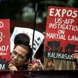 Activists protested against martial law while the debate was happening
