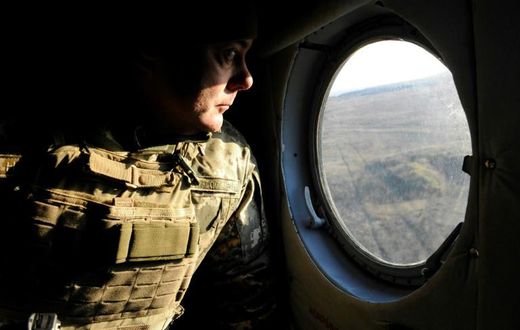 Lieutenant-general Sergiy Nayev, commander of the operation against Russian-backed rebels in eastern Ukraine, observes from his helicopter military drills near Urzuf village not far from the city of Mariupol
