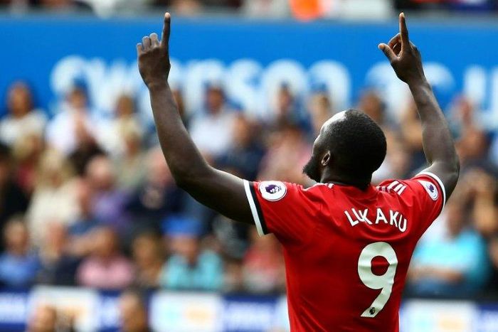 Manchester United's Romelu Lukaku celebrates after scoring against Swansea City during their Premier League match at the Liberty Stadium in south Wales, on August 19, 2017