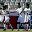 Iraqi players celebrate scoring against Japan during a 2018 World Cup qualifier in the Iranian capital Tehran on June 13, 2017