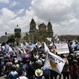 Members of the Peasant Development Committee take part in a demonstration demanding Guatemalan President Jimmy Morales' resignation in Guatemala City on August 28, 2017