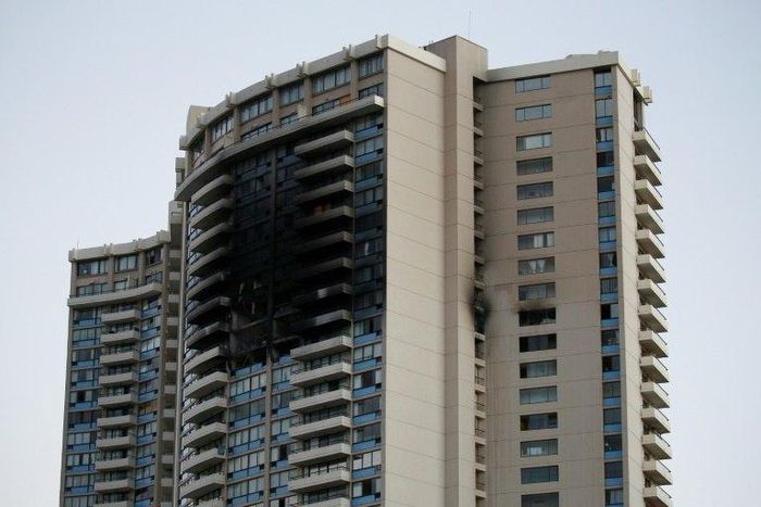 At least three people were killed and a dozen injured when a huge blaze burned through the Marco Polo apartment complex in Honolulu