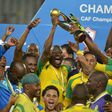 Mamelodi Sundowns players celebrate with the 2016 CAF Champions League trophy at the Borg el-Arab Stadium near Alexandria, Egypt on October 23, 2016