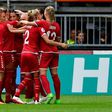 Denmark's forward Nadia Nadim (C) celebrates with teammates after scoring on July 30, 2017