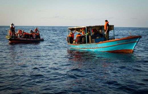 A handout photo released on September 24, 2018 by SOS Mediterranee shows migrants being rescued the day before off the coast of Libya