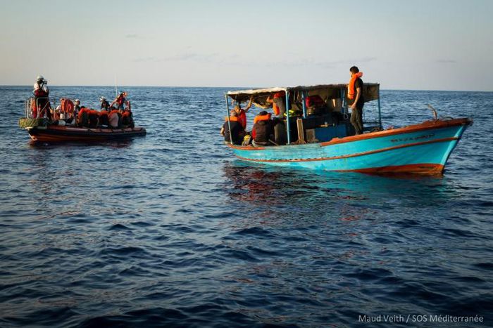 A handout photo released on September 24, 2018 by SOS Mediterranee shows migrants being rescued the day before off the coast of Libya