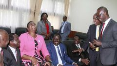 MP Aisha Jumwa shares a light moment with a section of Opposition MPs