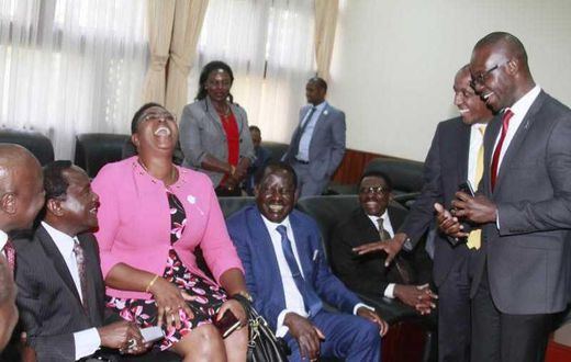 MP Aisha Jumwa shares a light moment with a section of Opposition MPs