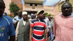 Nairobi Senator Mike Mbuvi Sonko (second right) leaves the Mombasa Law Courts on June 12, 2017 after he was discharged from being surety for the fugitive Mombasa Republican Council leader Omar Mwamnuadzi.