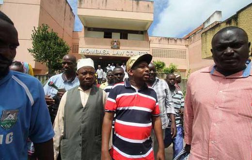 Nairobi Senator Mike Mbuvi Sonko (second right) leaves the Mombasa Law Courts on June 12, 2017 after he was discharged from being surety for the fugitive Mombasa Republican Council leader Omar Mwamnuadzi.
