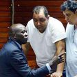 From left, lawyer Cliff Ombeta with suspects Baktash Akasha, Vijay Goswami, Gulam Hussein and Ibrahim Akasha at the Mombasa Law Courts