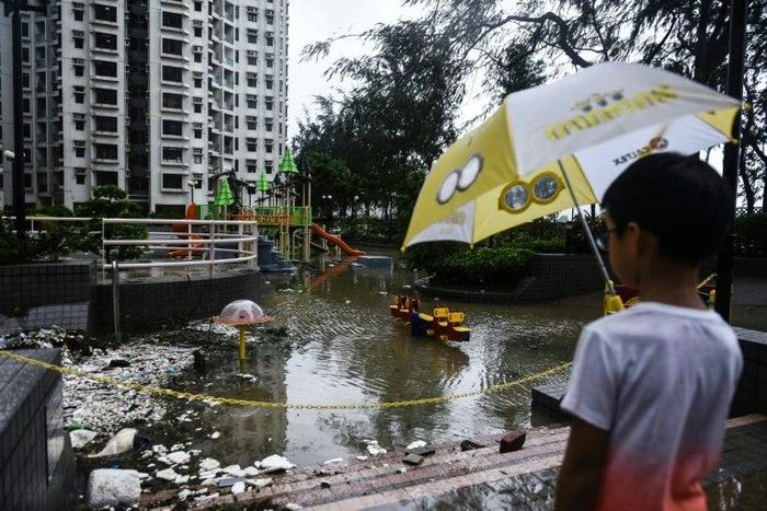 Typhoon Hato brought floodwaters and debris to large parts of Hong Kong