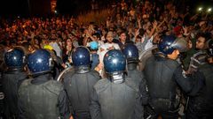 Protesters face security forces during a demonstration against corruption and employment in the northern Rif region, June 8, 2017 in Al Hoceima, Morocco