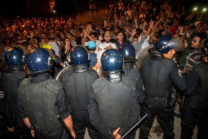 Protesters face security forces during a demonstration against corruption and employment in the northern Rif region, June 8, 2017 in Al Hoceima, Morocco