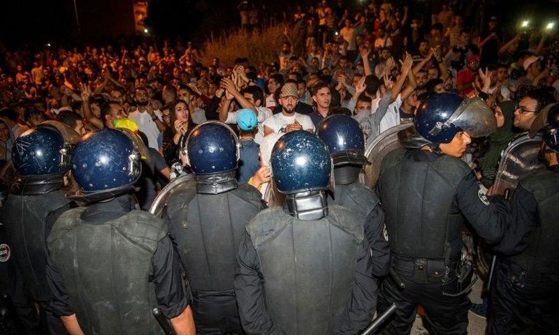 Protesters face security forces during a demonstration against corruption and employment in the northern Rif region, June 8, 2017 in Al Hoceima, Morocco