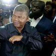 Joao Lourenco, the expected successor to Angola's longtime President Jose Eduardo dos Santos, shows his inked finger after voting in Luanda