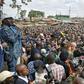 Kenya's opposition leader Raila Odinga (L) speaks in the Kibera district of Nairobi on August 13, 2017