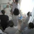 This undated video grab obtained July 11, 2017 shows Chinese Nobel Laureate Liu Xiaobo surrounded by doctors and his wife Liu Xia at an undisclosed location. The US government has expressed concern about the cancer-stricken democracy activist