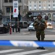 A soldier stands alert in a cordoned off area outside Gare Central in Brussels on June 20, 2017, after an explosion