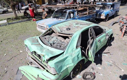 The aftermath of a suicide car bombing in front of a police station in the Iranian city of Chabahar on December 06, 2018