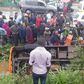 The matatu in the ditch with passengers stuck inside