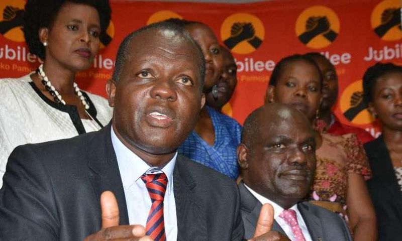 Jubilee Secretary General Raphael Tuju and IEBC chairman Wafula Chebukati