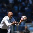 AS Roma's coach Luciano Spalletti catches the ball during the Italian Serie A football match against Lazio April 30, 2017