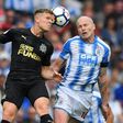 Huddersfield Town's Aaron Mooy (right) in action during the Premier League match against Newcastle United on August 20, 2017