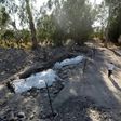 A man walks next to an archaeological site in northern Israel on August 6, 2017. The site is believed to be the location of a biblical village that was home to Saint Peter