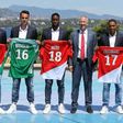 Monaco's new signings, (from L) Terence Kongolo, Diego Benaglio, Souahilo Meite, Youri Tielemans and Jordi Mboulla, pose with the club's Vice President Vadim Vasilyev (3rd R), during official presentation in Monaco, on July 26, 2017