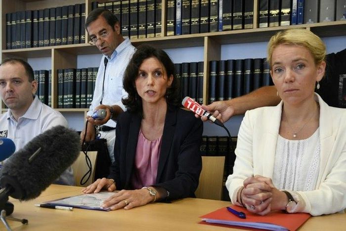 Lorient's prosecutor Laureline Peyrefitte (C) gives a press conference along with vice-prosecutor Cecile Flamet (R) and police chief Jonathan Rey (L) on July 13, 2017 in Lorient, western France, after three human foetuses were discovered