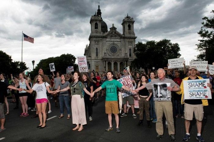 The acquittal of a Minneapolis police officer for the shooting death of a black motorist has sparked protests in the city even as authorities investigate the death of an Australian woman in another police shooting