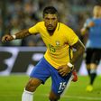 Brazil midfielder Paulinho has joined Barcelona from Chinese club Guangzhou Evergrande