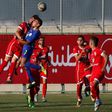 Players from Shabab Rafah (in blue) and Ahly al-Khalil tussle for the ball during the second leg of the Palestinian Cup final on August 4, 2017