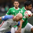 USA's Michael Bradley (L) fights for the ball with Mexico's Oswaldo Alanis during their FIFA World Cup CONCACAF qualifier, in Mexico City, on June 11, 2017