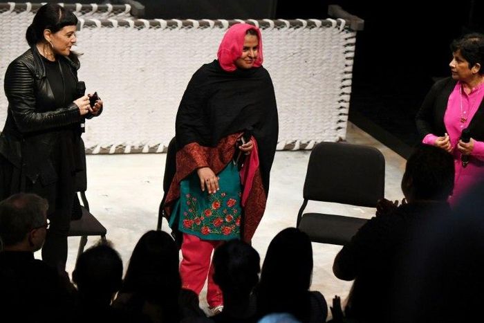Pakistani human rights activist Mukhtar Mai (C) receives a standing ovation as she takes the stage following performance of the opera 'Thumbprint', at the Roy and Edna Disney/Calarts Theater (REDCAT) in Los Angeles, on June 16, 2017