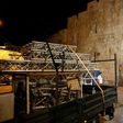 A truck removes the remaining barriers from Jerusalem's Al-Aqsa mosque compound on July 27, 2017
