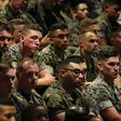 Members of the US military listen to Trump's speech