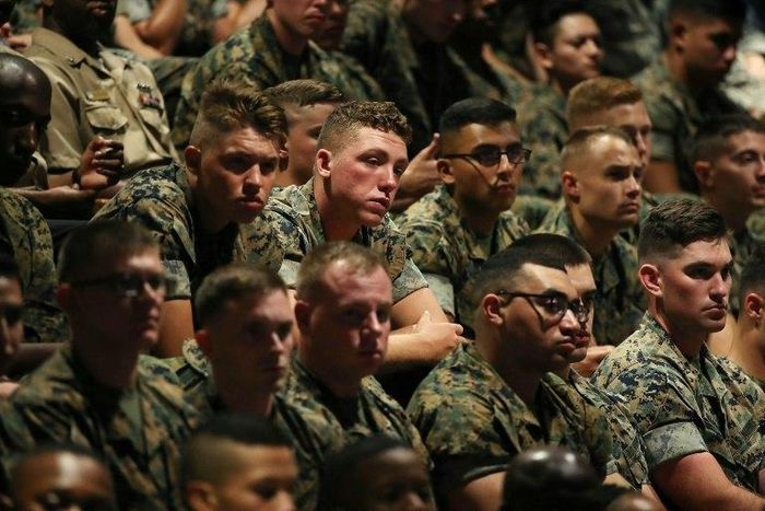 Members of the US military listen to Trump's speech