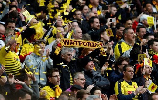 Watford fans cheer in London on April 24, 2016