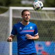 Iceland's midfielder Gylfi Sigurdsson eyes the ball during a Euro 2016 training session at the d'Albigny sports center in Annecy-le-Vieux on June 11, 2016 during the Euro 2016 football tournament
