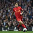 Liverpool's midfielder Philippe Coutinho runs with the ball during the English Premier League football match against Manchester City March 19, 2017