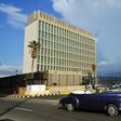 A vintage US car passing in front of the US Embassy in Havana on December 17, 2015. US and Canadian officials are investigating after reports that their dilpomats fell sick in the city after a possible "sonic attack"