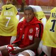 Monaco's forward Kylian Mbappe sits on the bench at the start of the French L1 football match against Marseille August 27, 2017